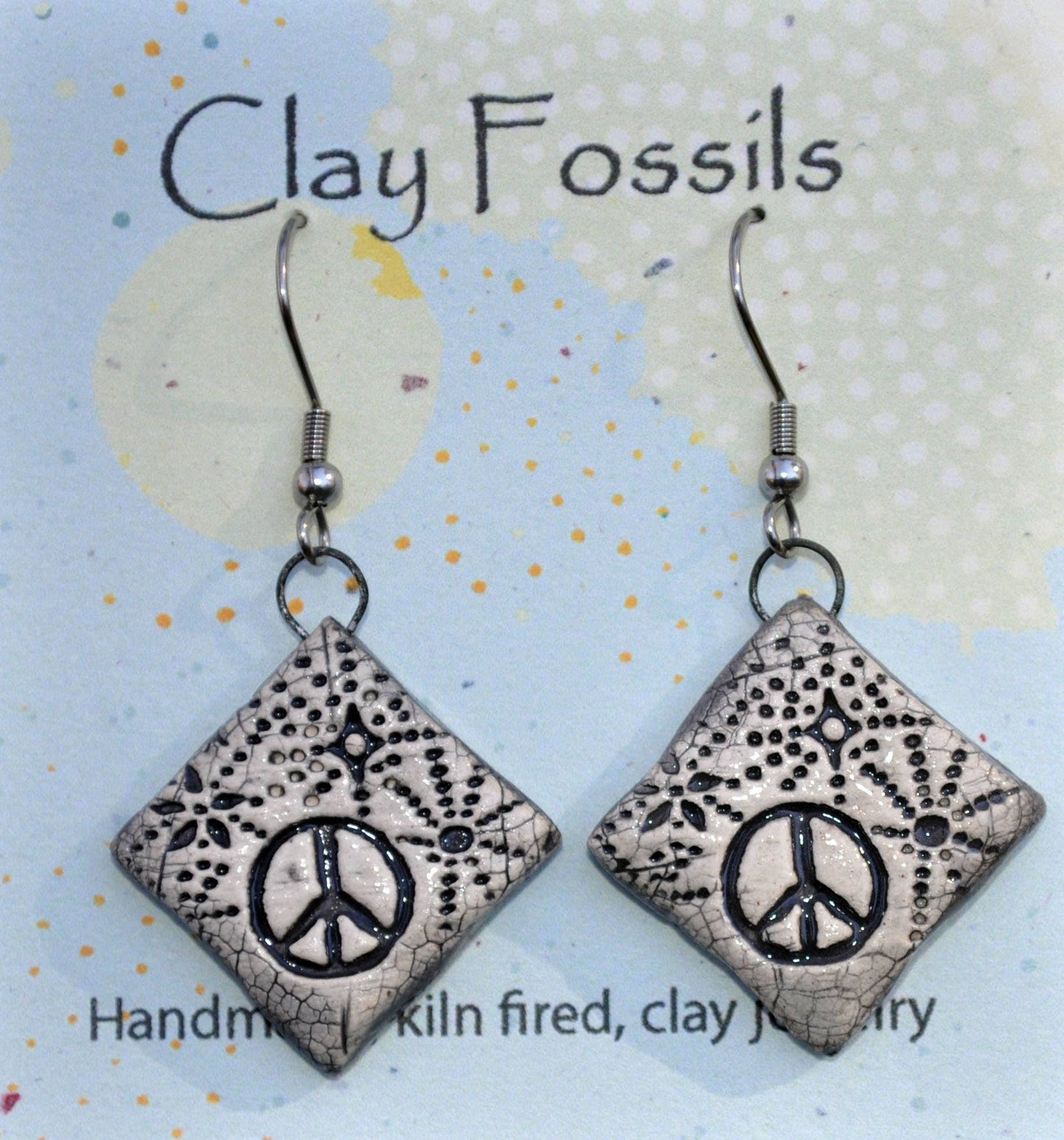 Earrings, Cosmic Peace, fired ceramic clay, USA
handmade