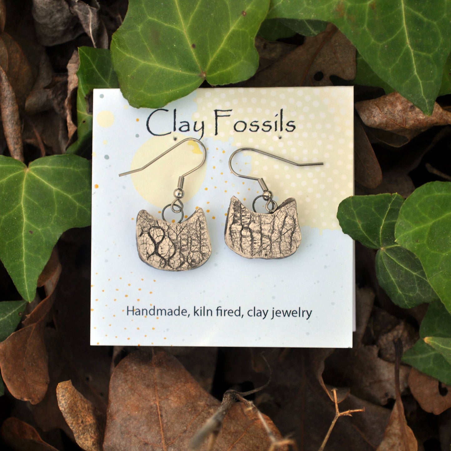 Earrings, human cat, white, fired pottery, clay, USA