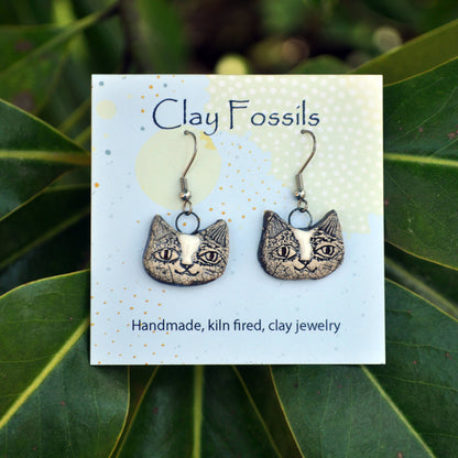 Earrings, human cat, white, fired pottery, clay, USA